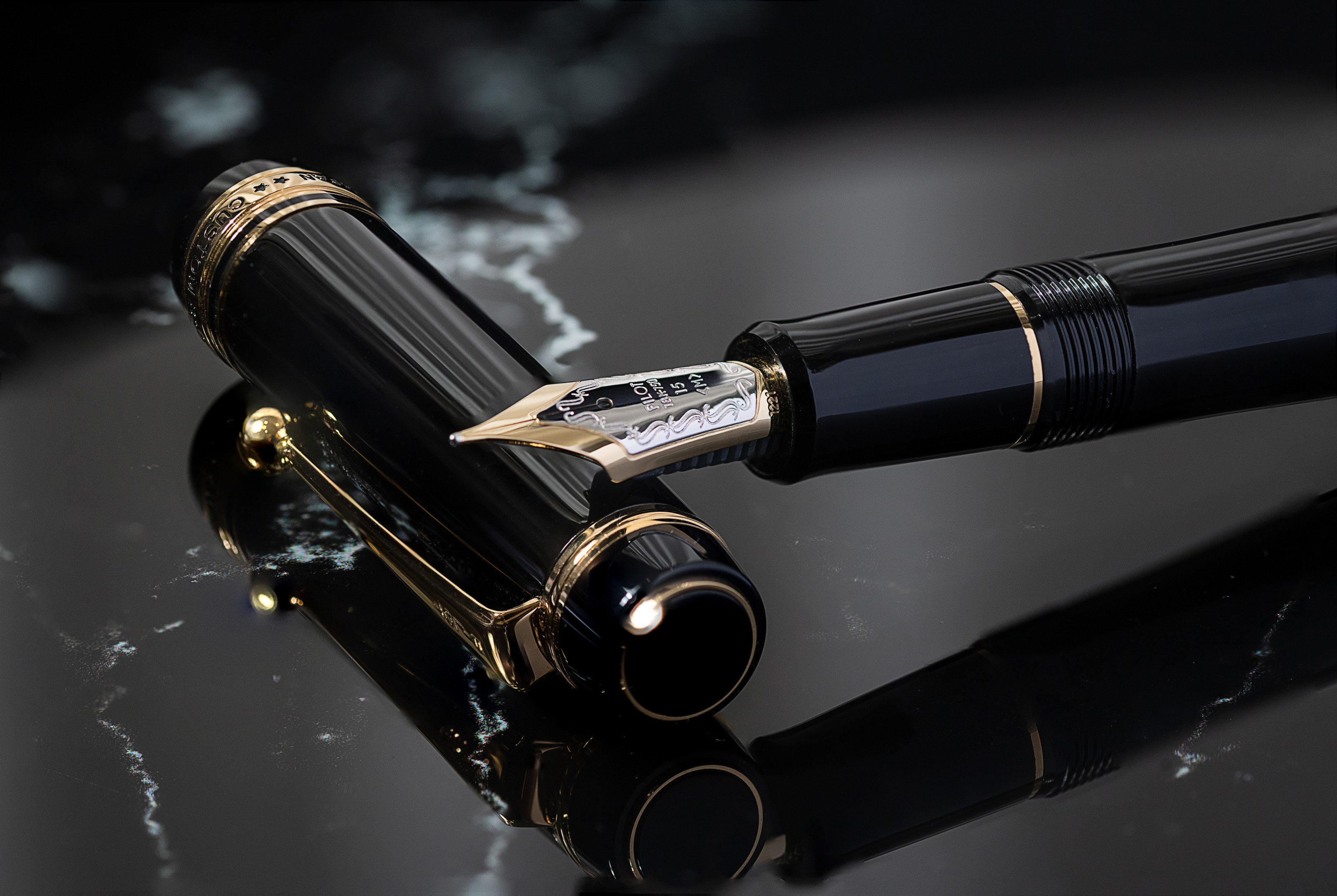 A close-up image of the Pilot CUSTOM 845 fountain pen, showcasing the glossy depth of the urushi lacquer on the barrel and cap. Engraved swirls and Pilot branding adorn the gold nib and trim, highlighting the value, craftmanship and prestige of a fountain pen
