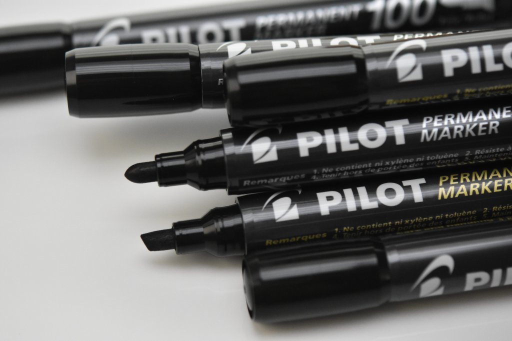 Pilot SCA Permanent Markers in Bullet and Chisel Tip with Black Ink.